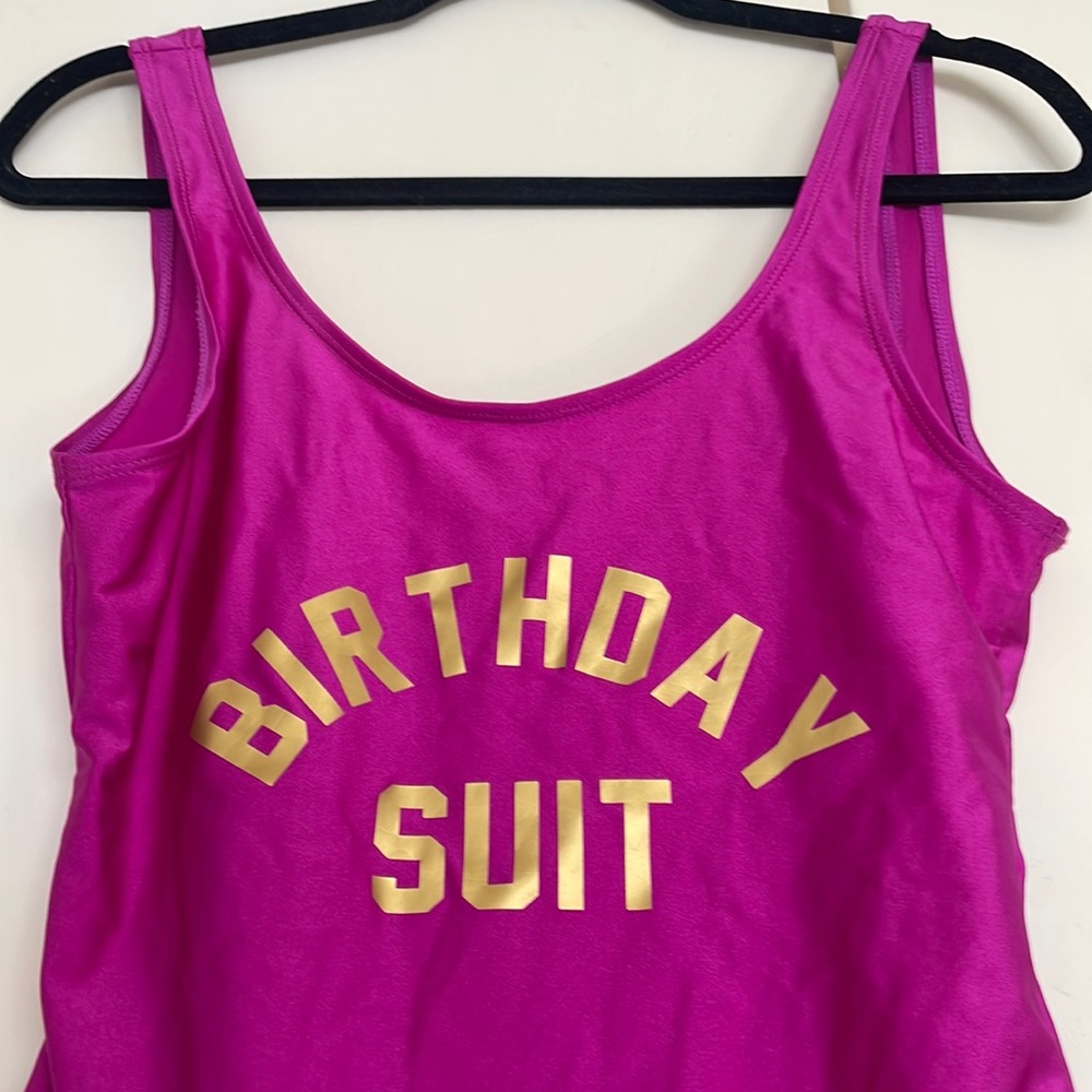Birthday Suit Pink One piece with gold foil letters